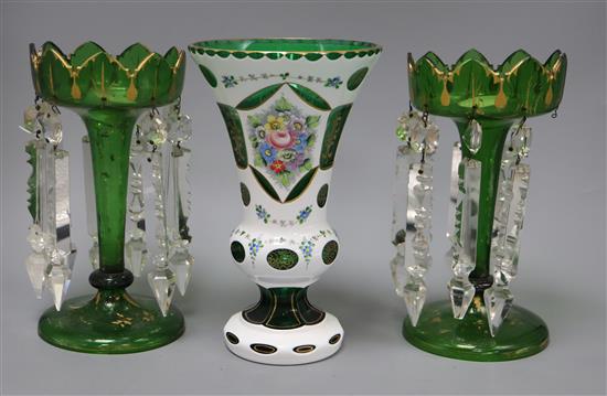 A pair of Victorian green glass table lustres and a 1950s Bohemian green and white layered glass vase tallest 24cm